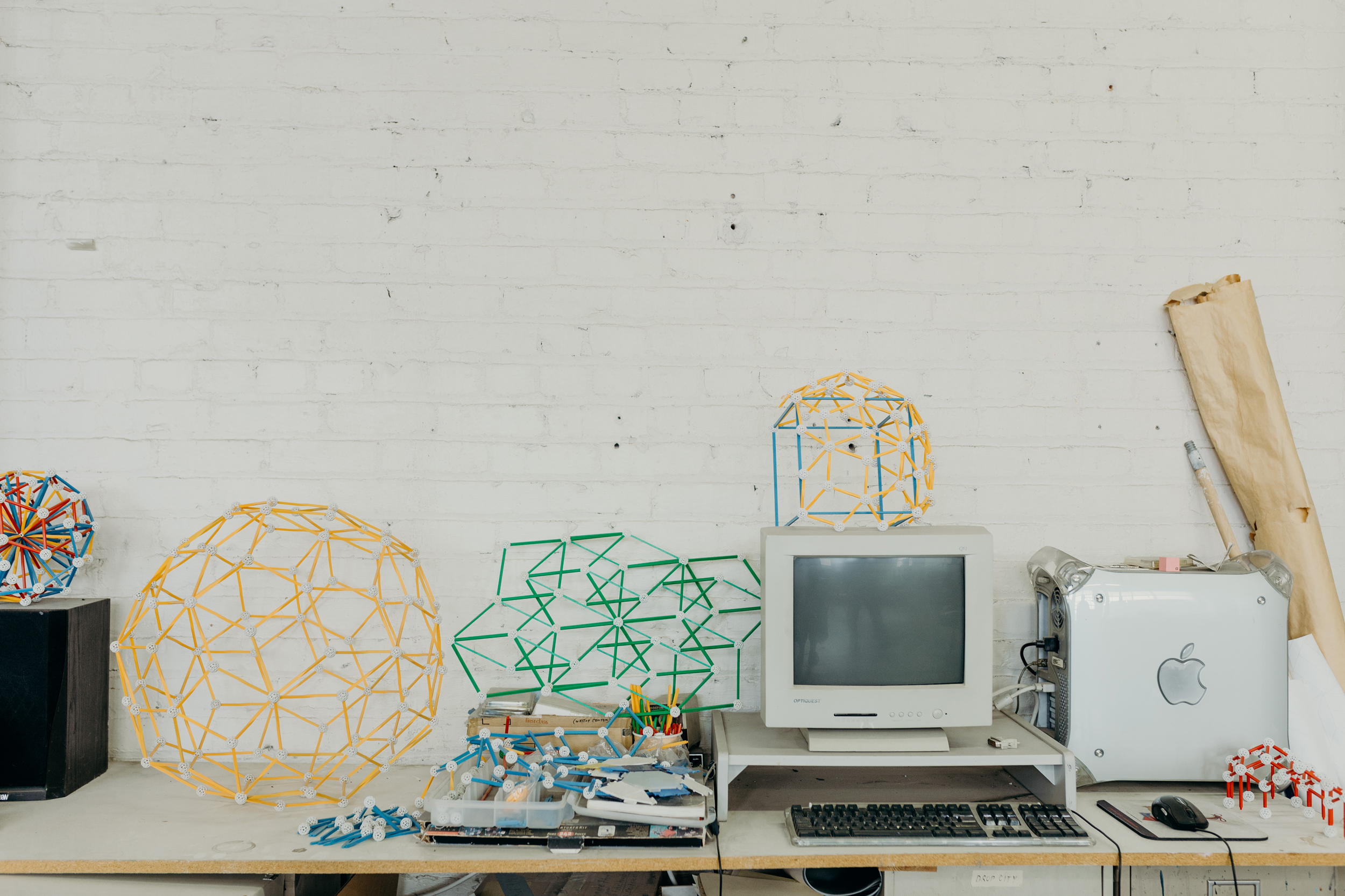 Geometrical models on a wooden desk. 