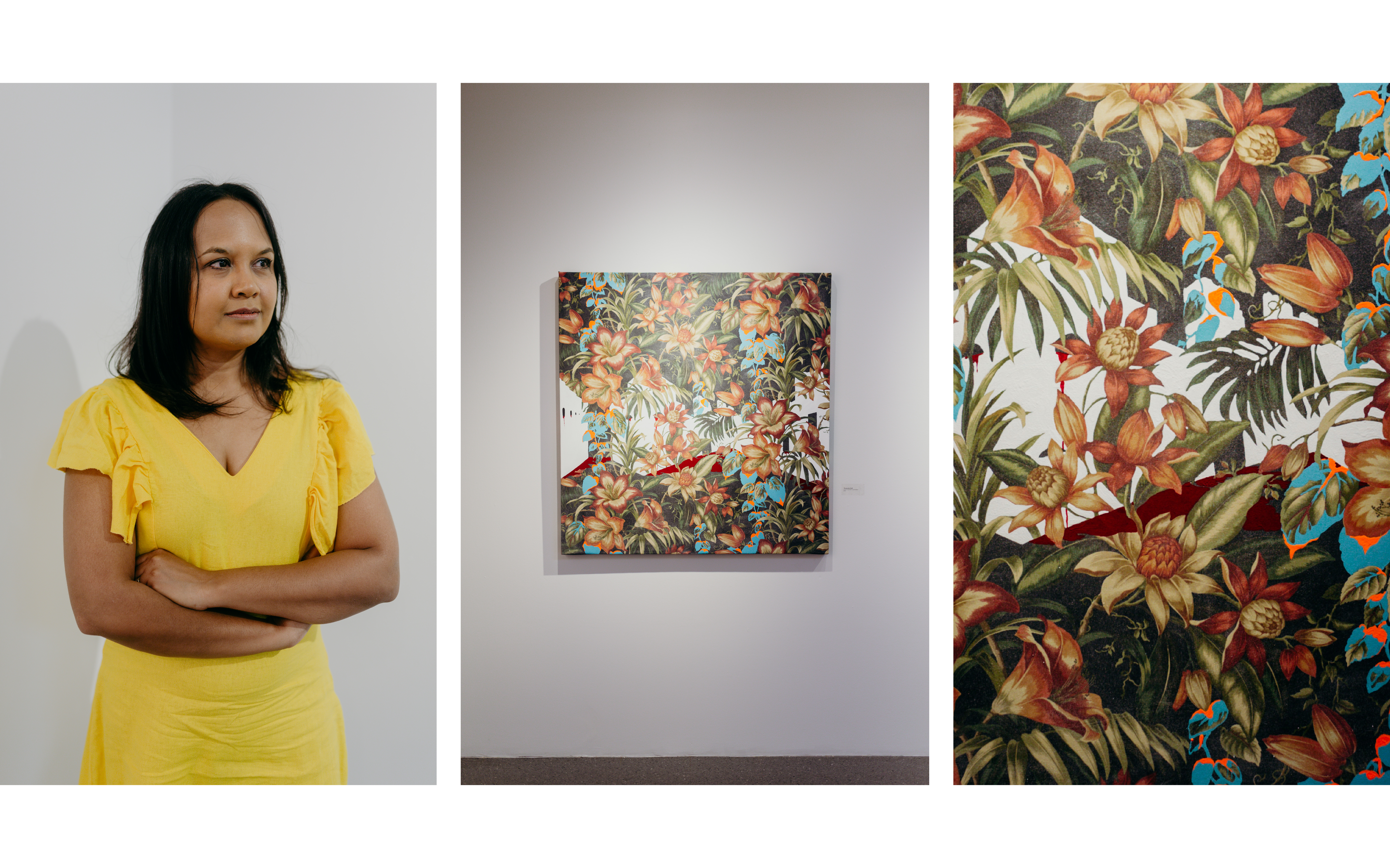 Suchitra poses against a white wall in a yellow dress. A painting of rust red flowers. 